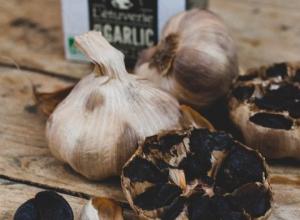 Organic whole head of black garlic