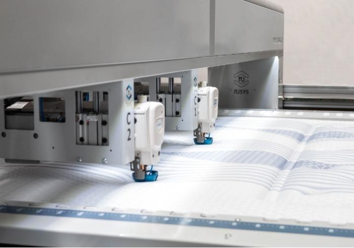 Mattress Wrapping, Folding and Rolling