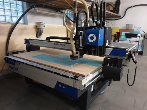 Slitting and rewinding machine