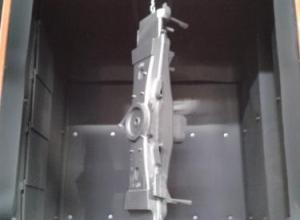 Shot blasting machine with hook
