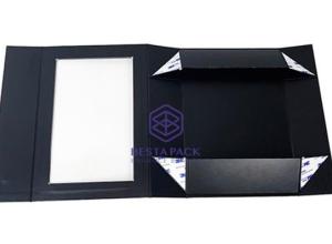 Rigid collapsible box