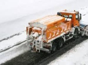 Tarpaulin cover for snow spreaders and ploughs